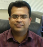 Dr. Monish Tandale